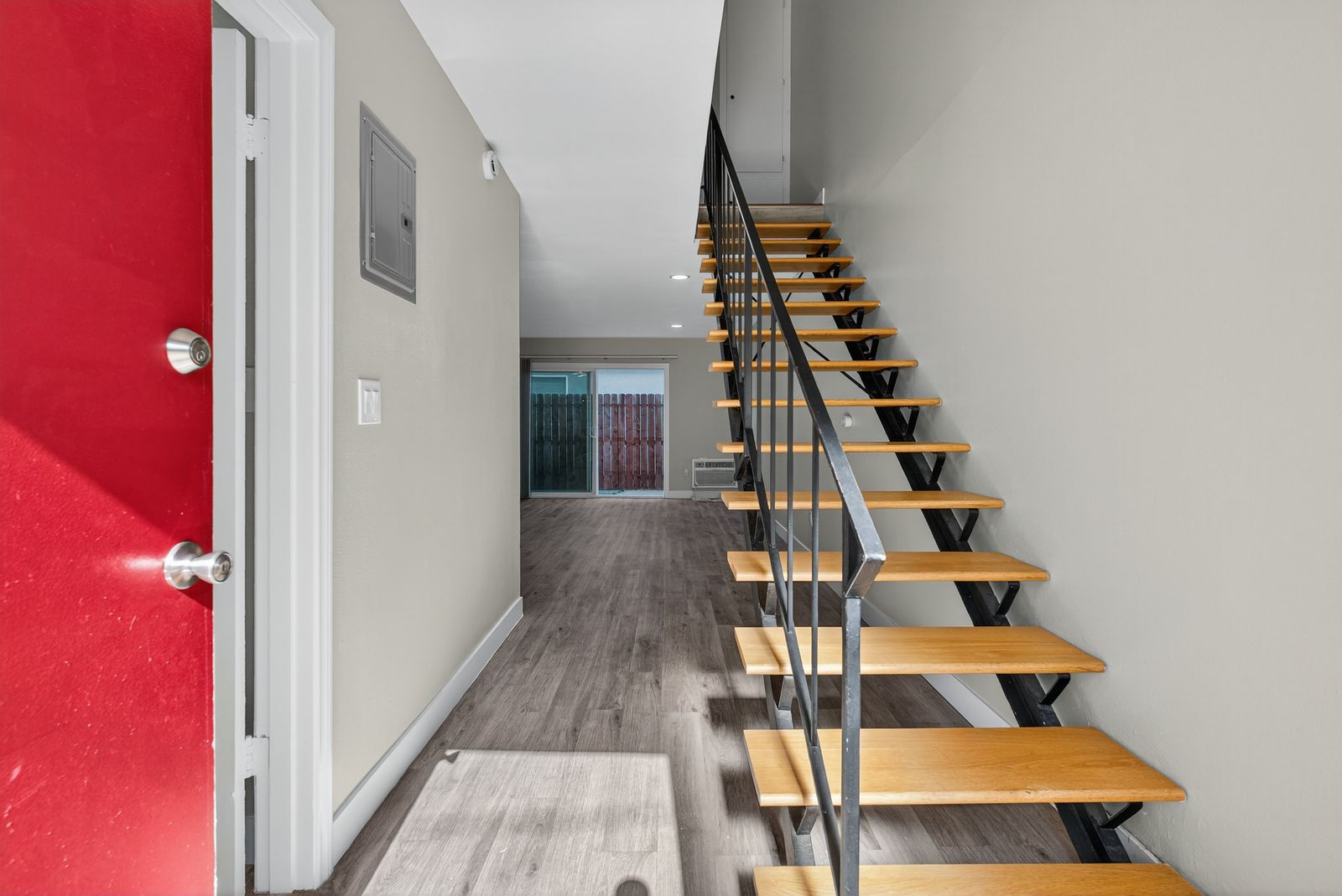 Stairwell and entry with electrical panel