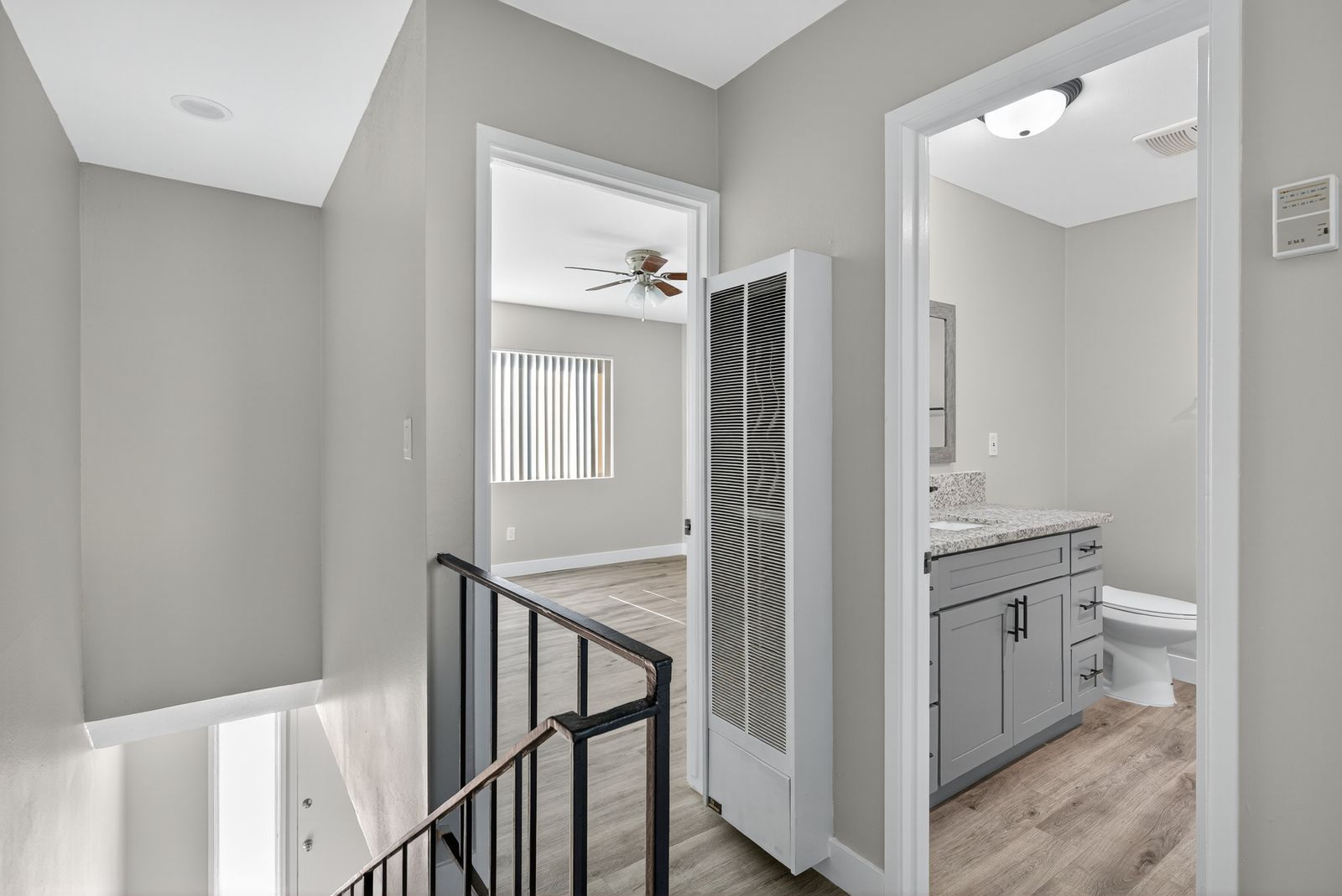 Upstairs hallway leading to bedroom and bath